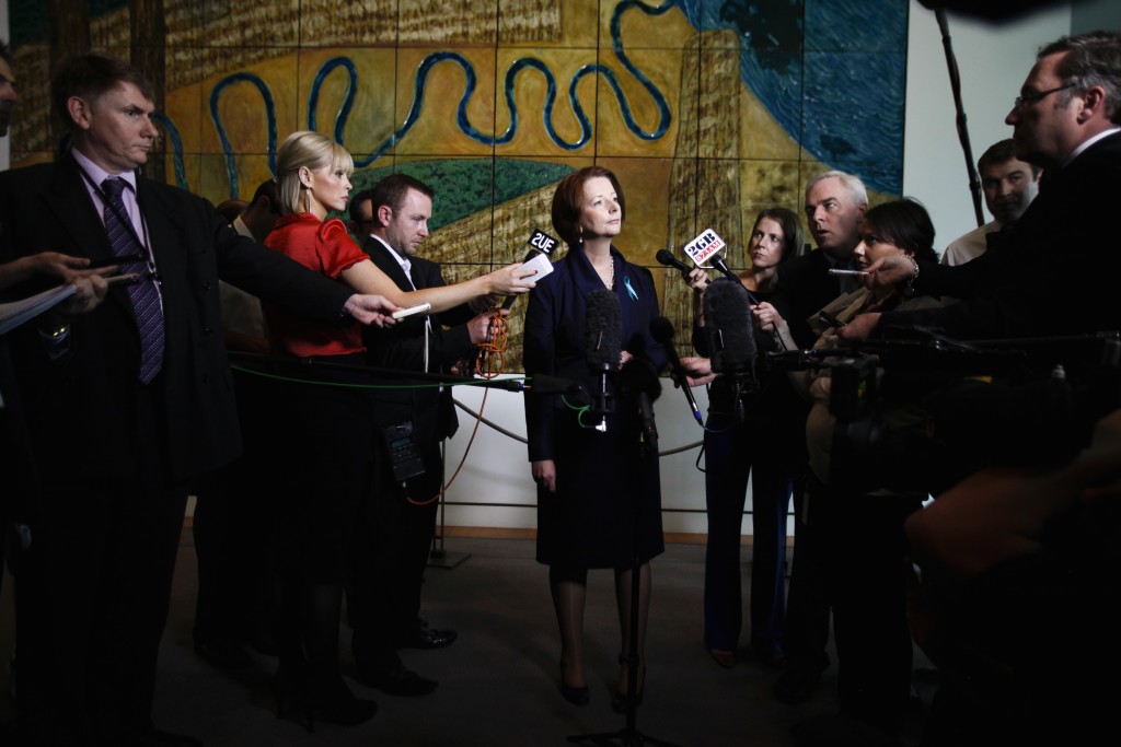 Prime Minister Julia Gillard speaks to the Press Gallery at a doorstop in the Mural Hall, Parliament House. Photo: Lukas Coch, courtesy of AAP.
