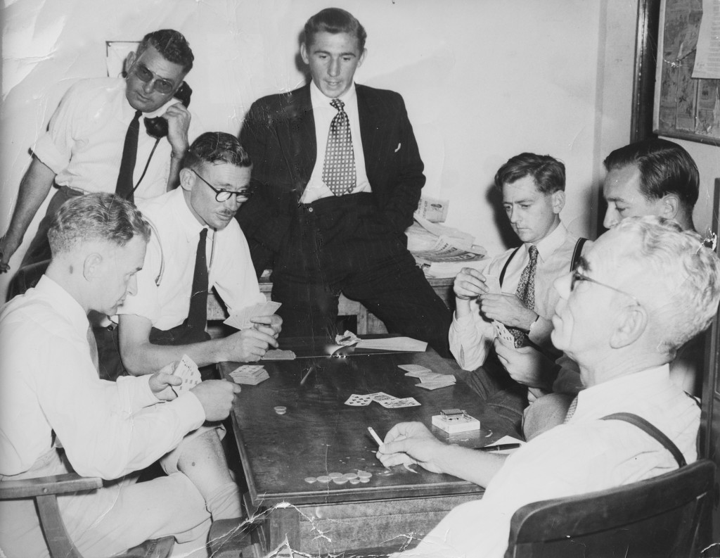A group of journalists playing cards in the Press Gallery common room, circa 1950. The coins on the table suggest they were playing for keeps. Photo courtesy of the Reid family collection. 